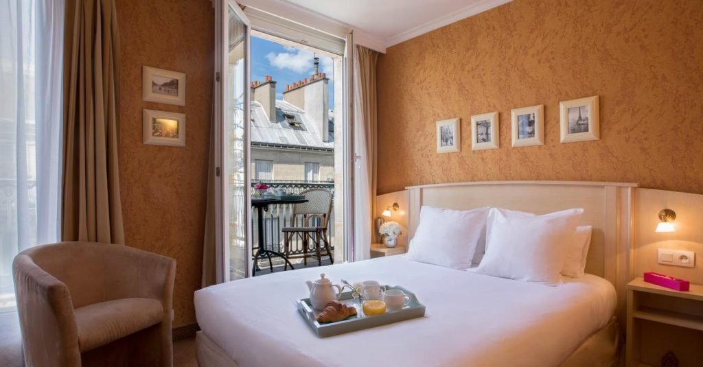 Quarto do Hotel Elysees Opera - super aconchegante - Foto: Divulgação