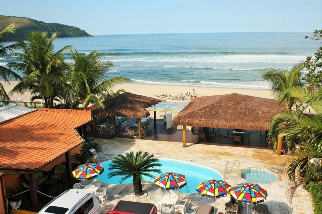 Vista da Praia e piscina na Pousada Beira Mar Maresias
