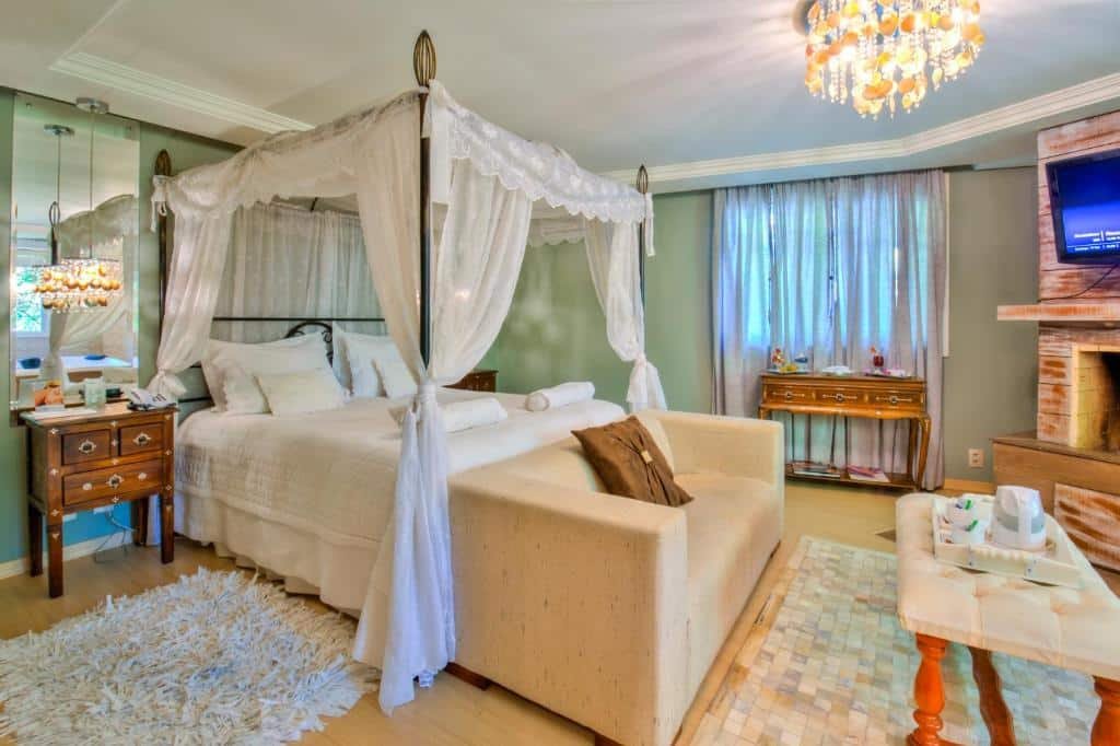 Foto de uma suíte na pousada Don Ramon & Spa Holgar D