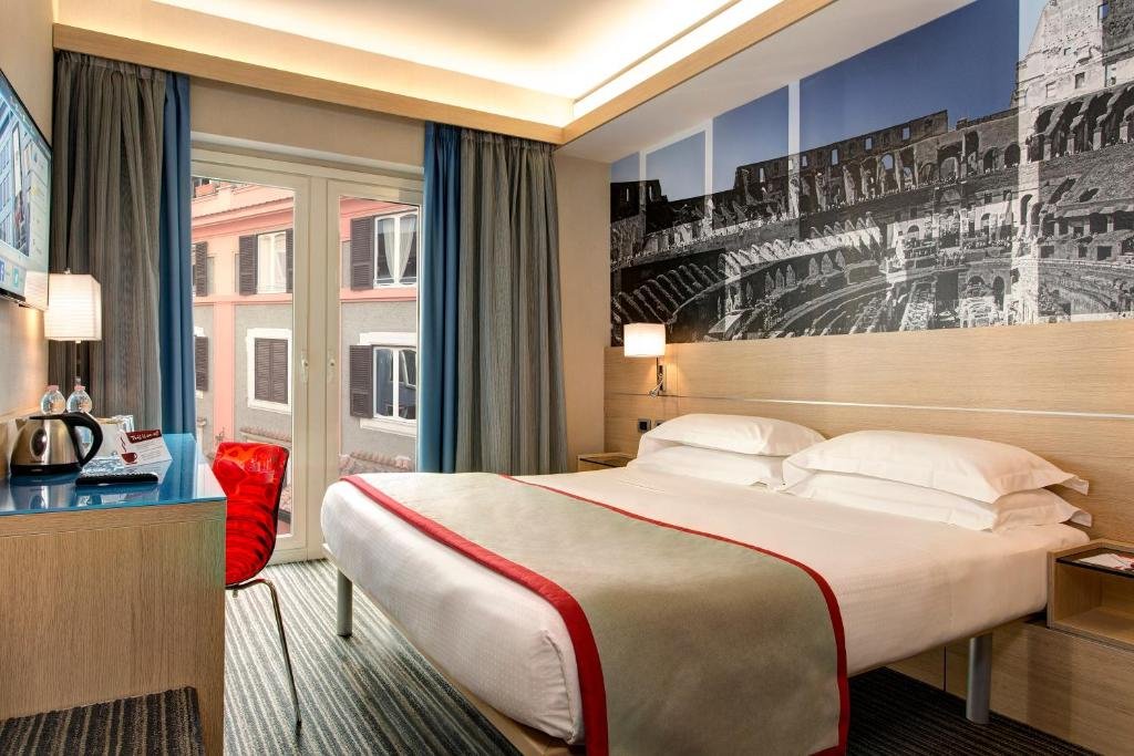 quarto do iQ Hotel Roma