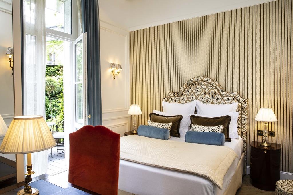 Quarto do hotel Relais Christine no Saint German de Près